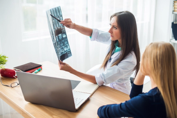Radiologist with a patient