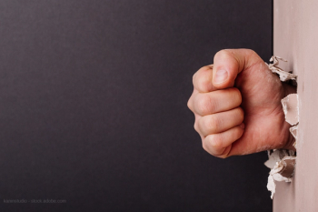 Fist through a wall