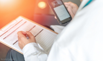 Doctor holding smartphone