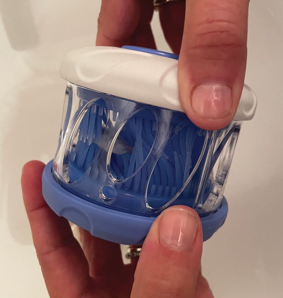 Inside Dr Mark’s HyGenie, the dental appliance is rinsed with water (Figure 3)