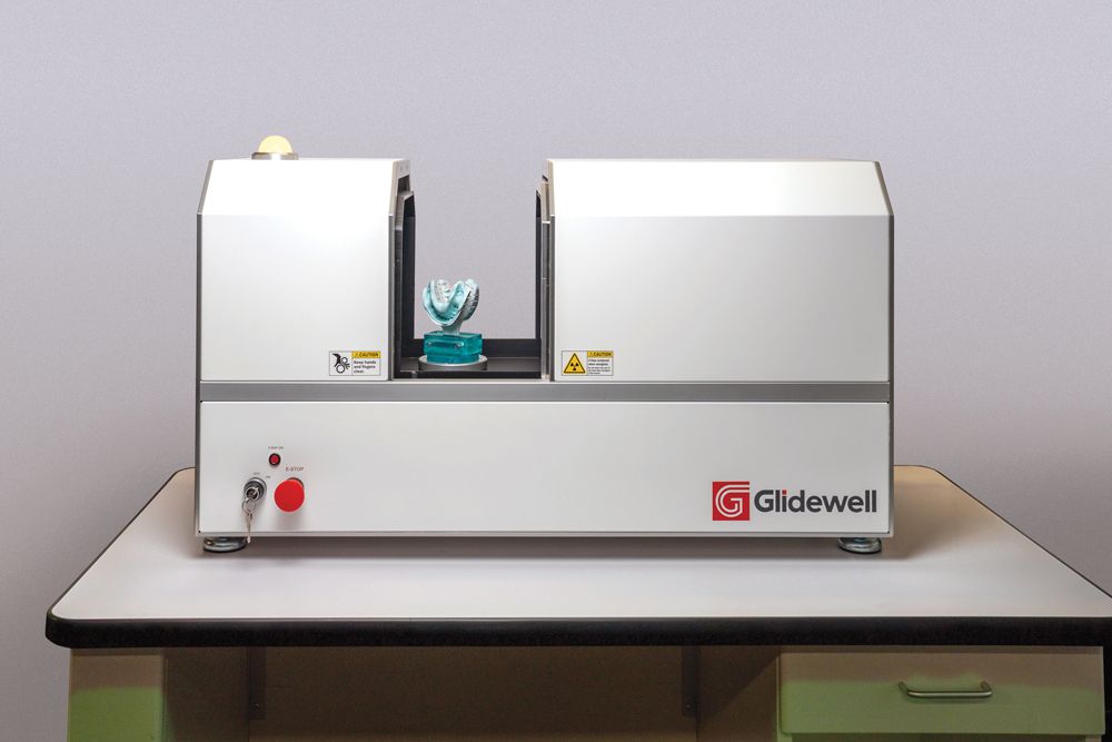 Glidewell Figure 1 : Custom impression scanner for enhanced efficiency.
