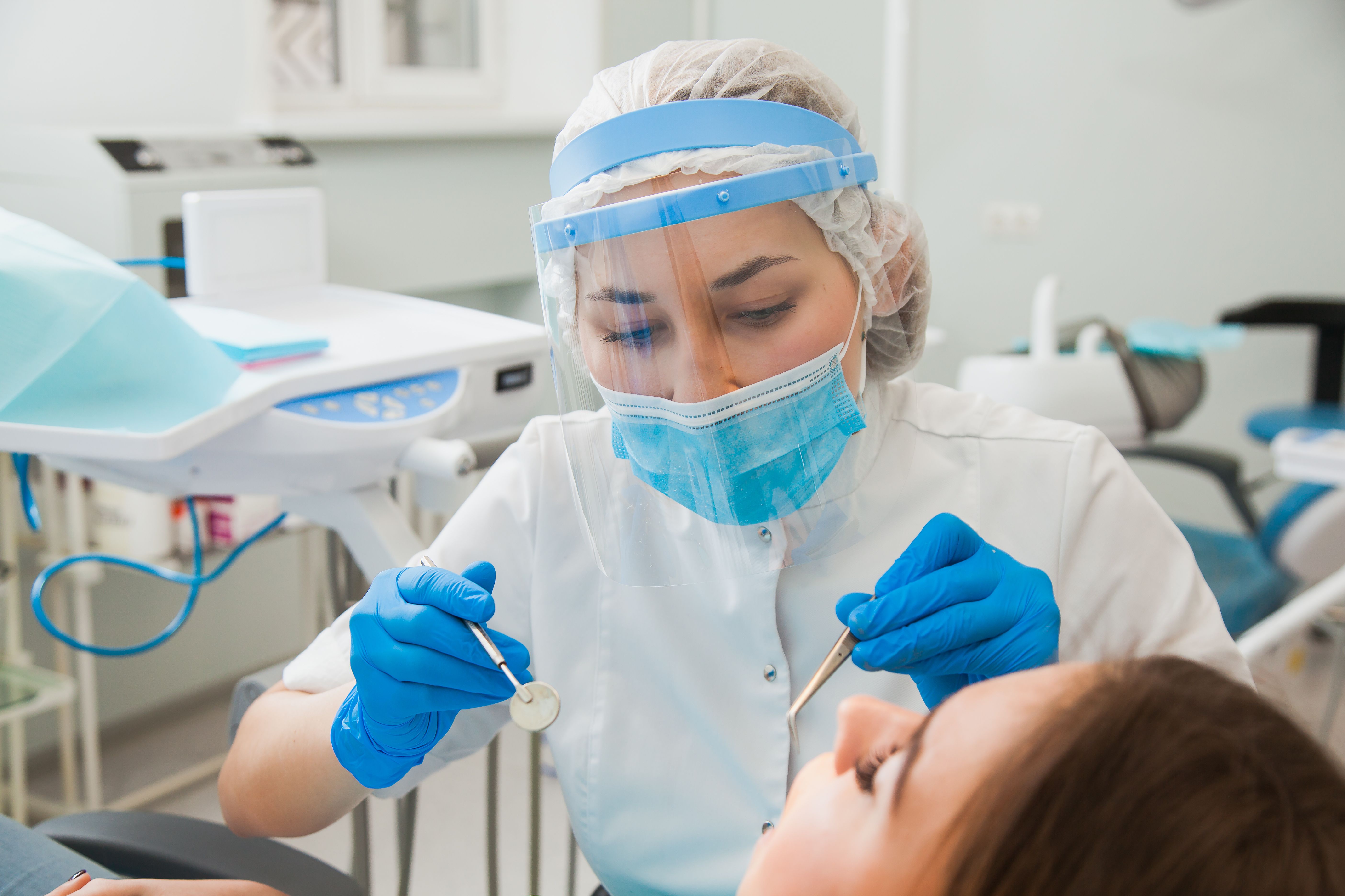 A patient getting a checkup at the dentist