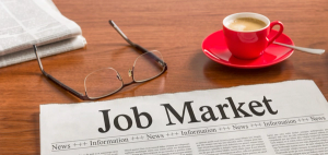 newspaper coffee cup and glasses on table