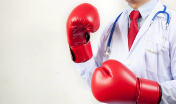 doctor wearing boxing gloves