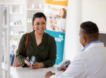 pharmacist counsels patients