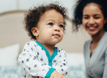 Close up image of baby and mother 