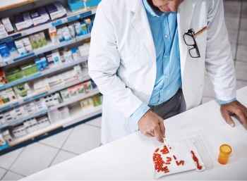 pharmacist filling prescriptions