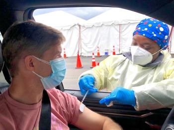 man receiving COVID-19 vaccine