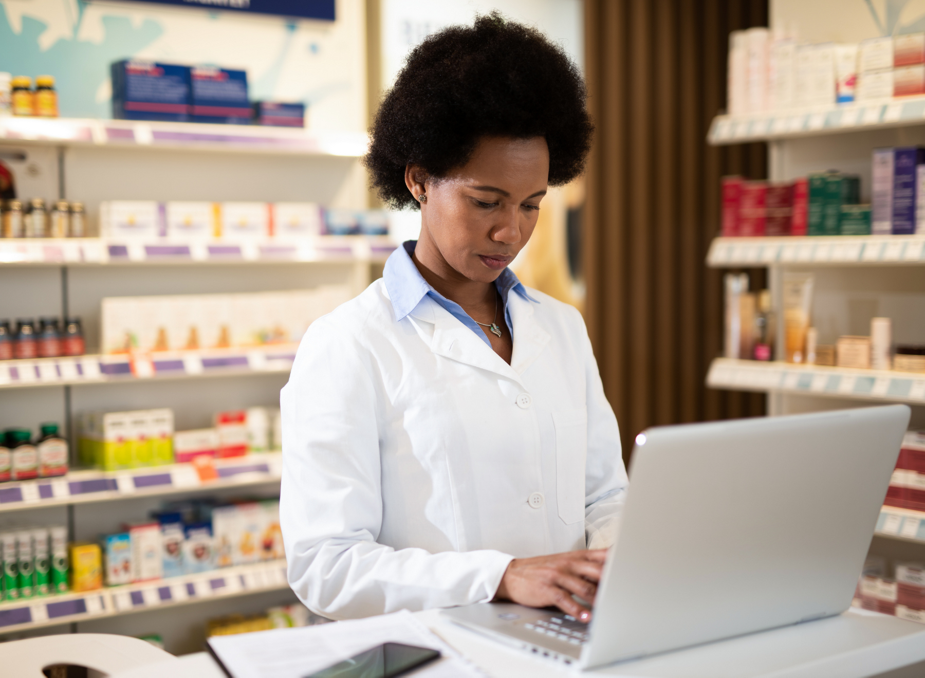 pharmacist on laptop