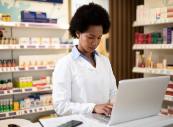 pharmacist on laptop
