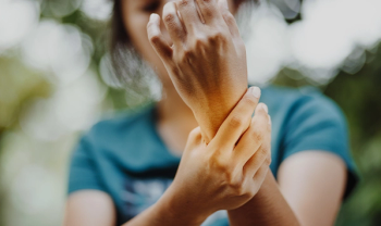 girl holding wrist