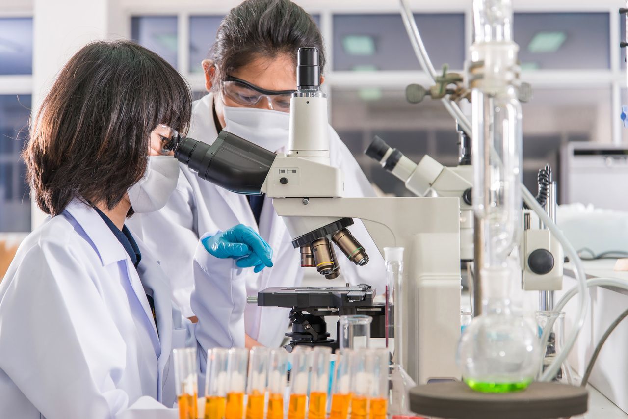 Scientists testing in lab