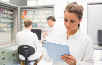 Pharmacist intern student working in pharmacy
