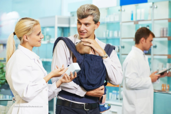 Pharmacist helping child
