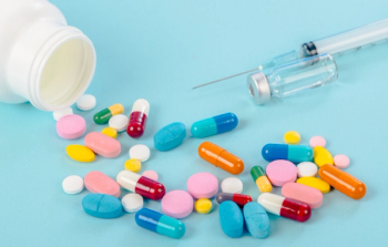 vaccine and pills out of bottle