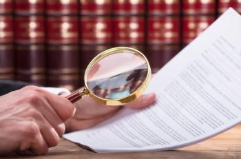 magnifying glass on paper 