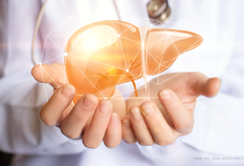 doctor holding liver graphic