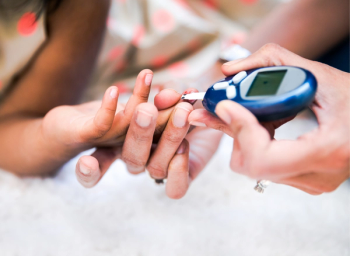 child checks blood glucose level