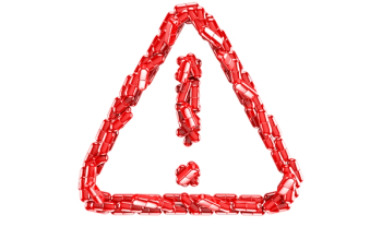 warning sign made of pills