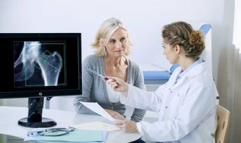 Doctor with Patient and Xray