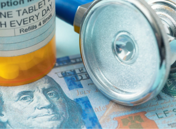 prescription bottle, one hundred dollar bill, and stethoscope