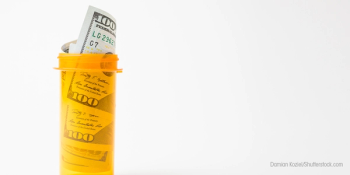 money in pill vial