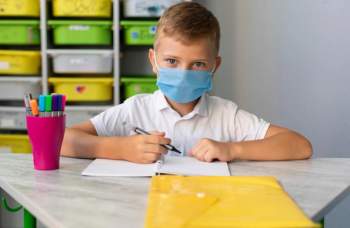 child with face mask