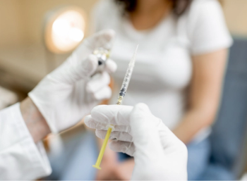 pregnant woman receives vaccine