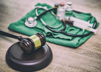 gavel and medical scrubs