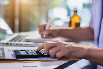 Pharmacist doing finances