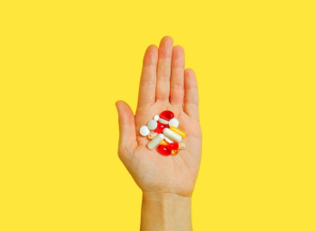 hand holding medications