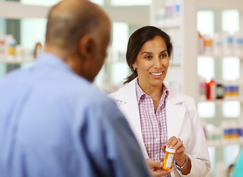Pharmacist assisting a customer