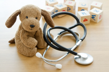 stethoscope with stuffed animal and blocks