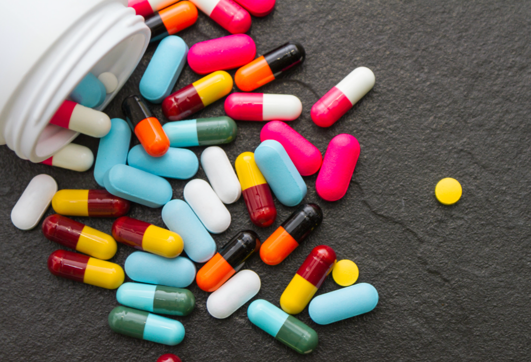 pills poured out of pill bottle
