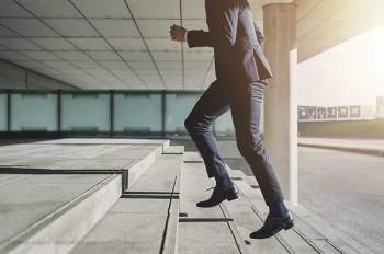 Man running up stairs