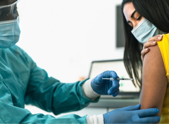 Woman receives COVID-19 vaccine