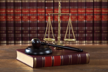 Law books with scale