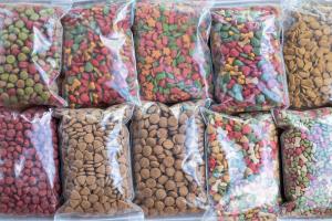 Bags of dog kibble stored in plastic bags