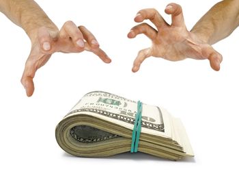 veterinary-human-hand-take-over-money-on-white-white-background-450px-shutterstock-70629907.jpg
