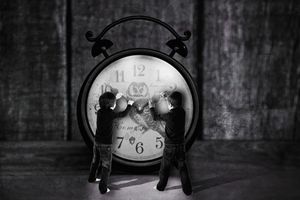 veterinary-two-boys-trying-to-pull-clocks-hand-450px-shutterstock-381738667.jpg