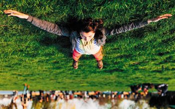 veterinary-girl-grass-relaxing-SS_293016779_450.jpg