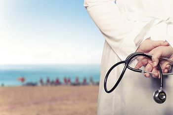 veterinary-doctor-beach-water-sand-AdobeStock_107107309_450px.jpg