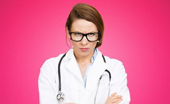 veterinary-female-vet-angry-glasses-pink-shutterstock-190519997-450.jpg