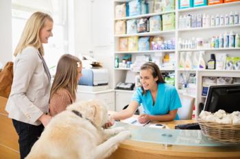 Robert Daly/KOTO / stock.adobe.com / happy vet office