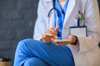 veterinary-young-doctor-on-phone_AdobeStock_115964793-450.jpg