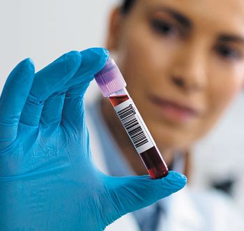 veterinary-blood-lab-work-female-tech-485204871_450.jpg
