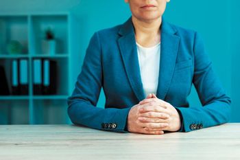 veterinary-business-negotiation-skills-with-female-executive-sitting-at-office-desk-with-confident-pose-and-hands-crossed-body-language-for-determination-and-willpower-534577561_450.jpg