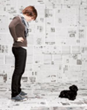 97361814_train_puppy_newspaper-746128-1384171626580.jpg