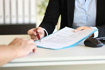veterinary-contract-signing-AdobeStock
