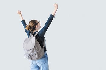 veterinary-happy-student-with-arms-raised-on-air-450px-shutterstock-717156646.jpg